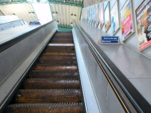 Going up the last wooden escalator on the London Underground at Greenford station
